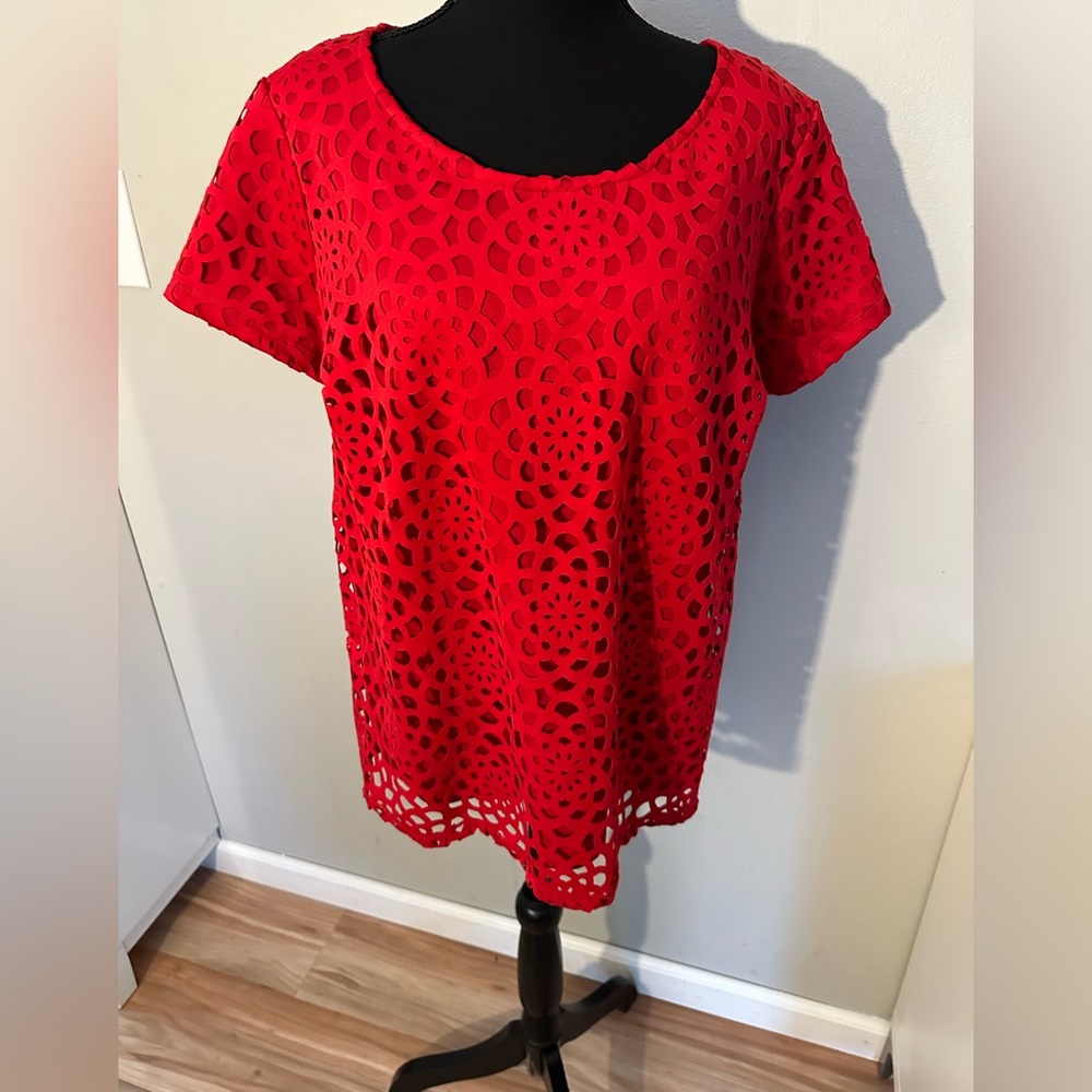 Roz and Ali. Red eyelet top with short sleeves